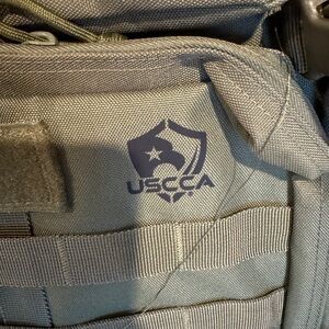 Gray Tactical Backpack with MOLLE Panel